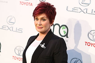 woman with red hair wearing black shawl-lapel blazer HD wallpaper