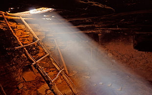 brown wooden ladder with light