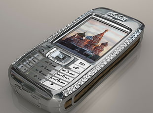 closeup photo of silver Ancort candybar phone with Saint Basil's Cathedral, Russia wallpaper HD wallpaper