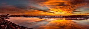 aerial photography of wide ocean at sunset, petitcodiac river