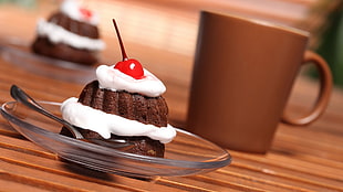 brown and white cake with brown ceramic mug