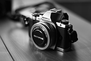 gray scale photo of Olympus MILC camera HD wallpaper