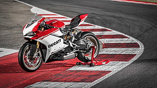 red and white Ducati sports bike HD wallpaper
