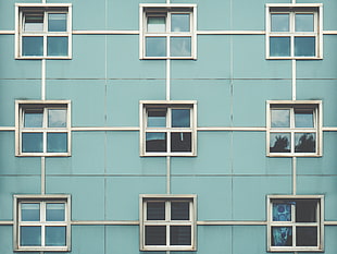 six white wood-framed 4-panel glass windows