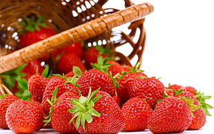red strawberry on brown woven basket HD wallpaper