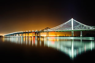 white bridge light during nightime HD wallpaper