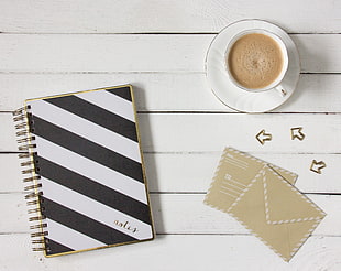 black and white stripe notebook and white ceramic teacup with saucer HD wallpaper