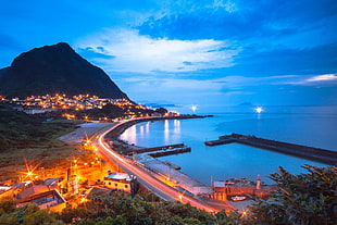 aerial view of city houses and road during nighttime, taiwan