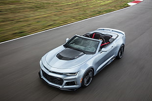 timelapse photography of silver Chevrolet Camaro convertible on concrete road HD wallpaper