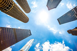 worm's eye view of high rise buildings during daytime