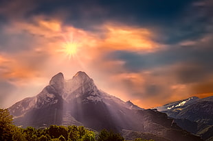 low-photo of black and white snowy mountain