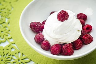 raspberries with whip cream on white bowl HD wallpaper