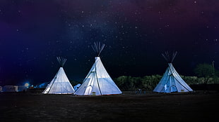 long exposure photograph of three white teepee tents HD wallpaper