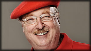 man in red cap and shirt