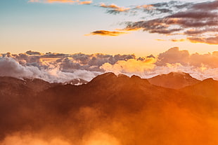 mountain under blue and white sky