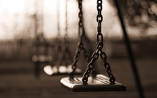 brown metal outdoor swing in focus photography, urban, swings, sepia