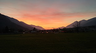 landscape photo of a sunset, mountains, landscape, sunlight