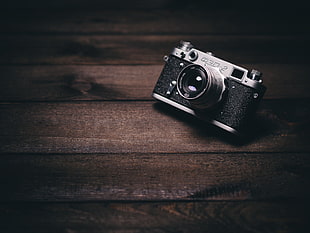 gray and black analog camera on brown wooden surface HD wallpaper