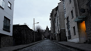 brown concrete buildings, Edinburgh, alleyway, light bulb, clouds HD wallpaper