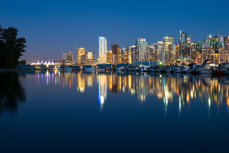 photo of city near calm body of water, vancouver HD wallpaper