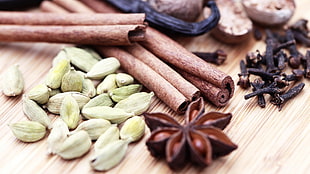 cooking spices on brown wooden board