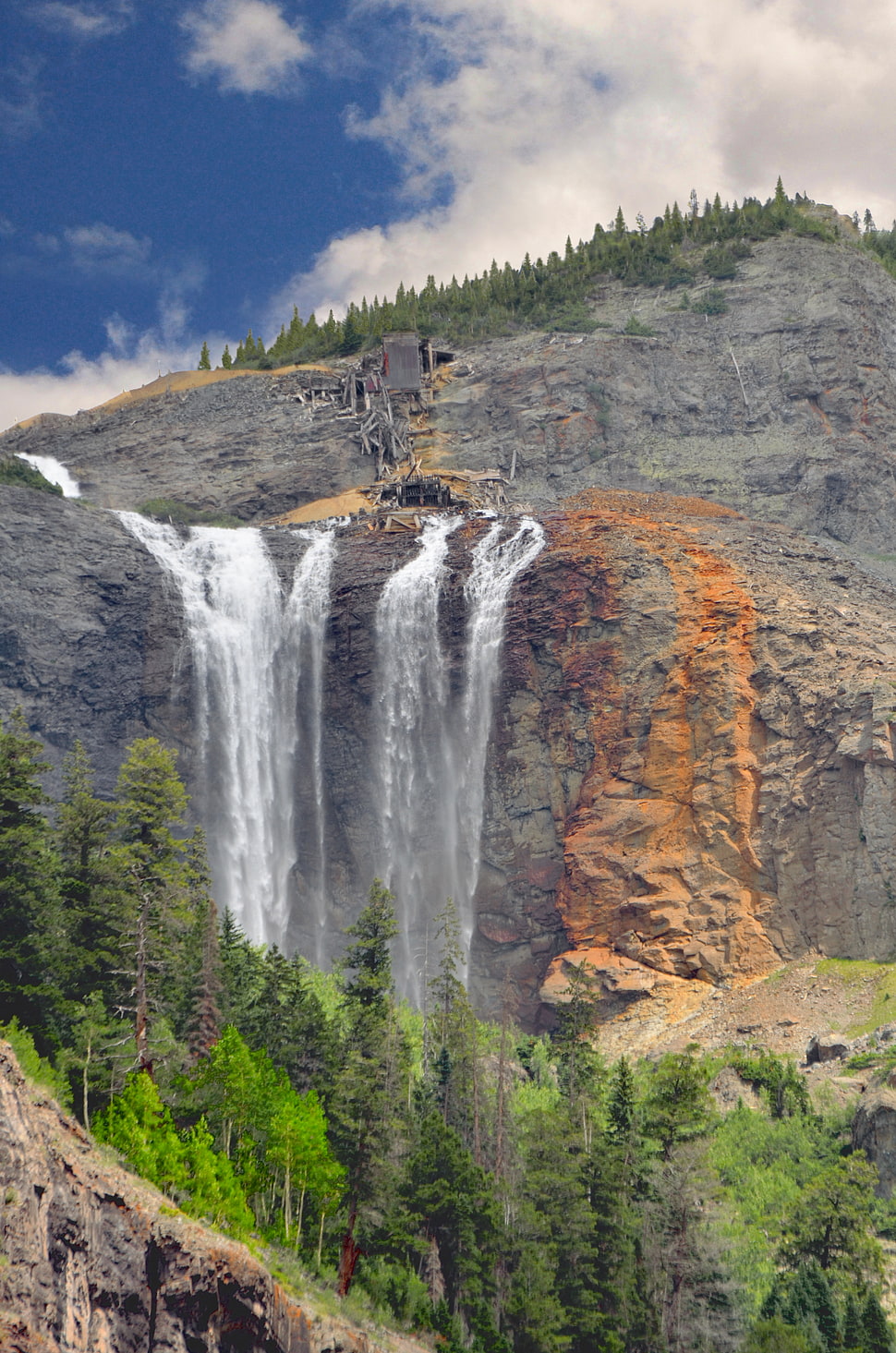 landscape photo of gray rocky mountain with waterfalls during daytome HD wallpaper