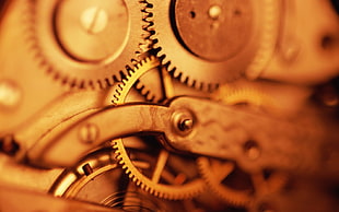 shadow depth of field photography of brass-colored gears HD wallpaper