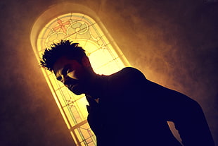 black suited man beside stained glass window HD wallpaper