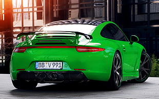 green sports coupe HD wallpaper