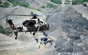 two black and gray helicopters on flight HD wallpaper