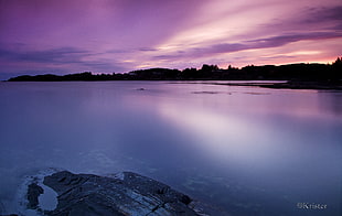 timelapse photography of body of water under cloudy sky HD wallpaper