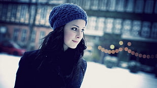 woman in black jacket and blue knitted cap during snow HD wallpaper