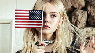 person holding mini U.S. flag, celebrity, actress, Elle Fanning, blonde HD wallpaper