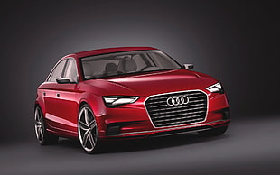 photography of red Audi sedan