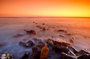 landscape photograph of rock formation during sunset HD wallpaper