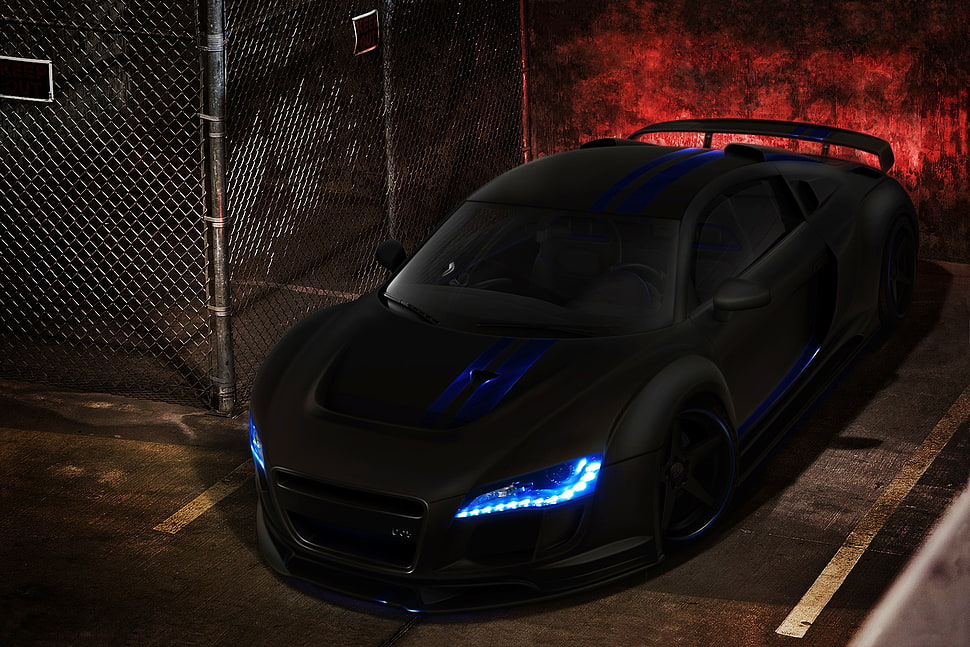 matte black sports coupe parked beside gray cyclone fence HD wallpaper