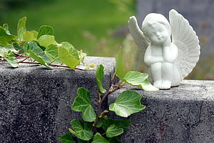 white ceramic angel decor