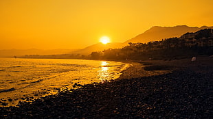 body of water, sunset, beach, landscape, mountains