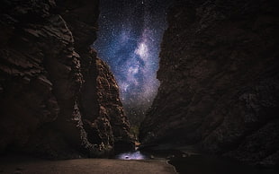 calm body of water in between of rock formation, nature, landscape, dark, path