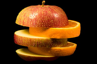 apple and orange sliced HD wallpaper
