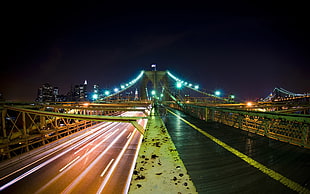 timelapse photography of Brooklyn Bridge during nighttime HD wallpaper