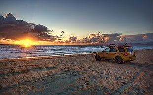 yellow SUV, beach, sunset, sea, clouds HD wallpaper