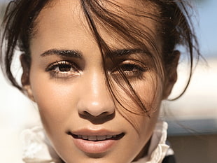 selective focus photography of woman's face