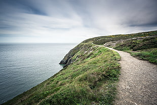 green mountain near sea, ireland