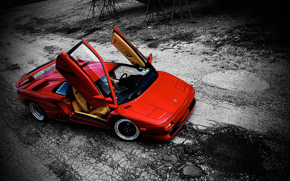 parked red coupe with doors opened HD wallpaper