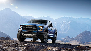 blue Ford F-150 on the hill during daytime HD wallpaper