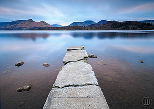 gray stone dock on body of water HD wallpaper