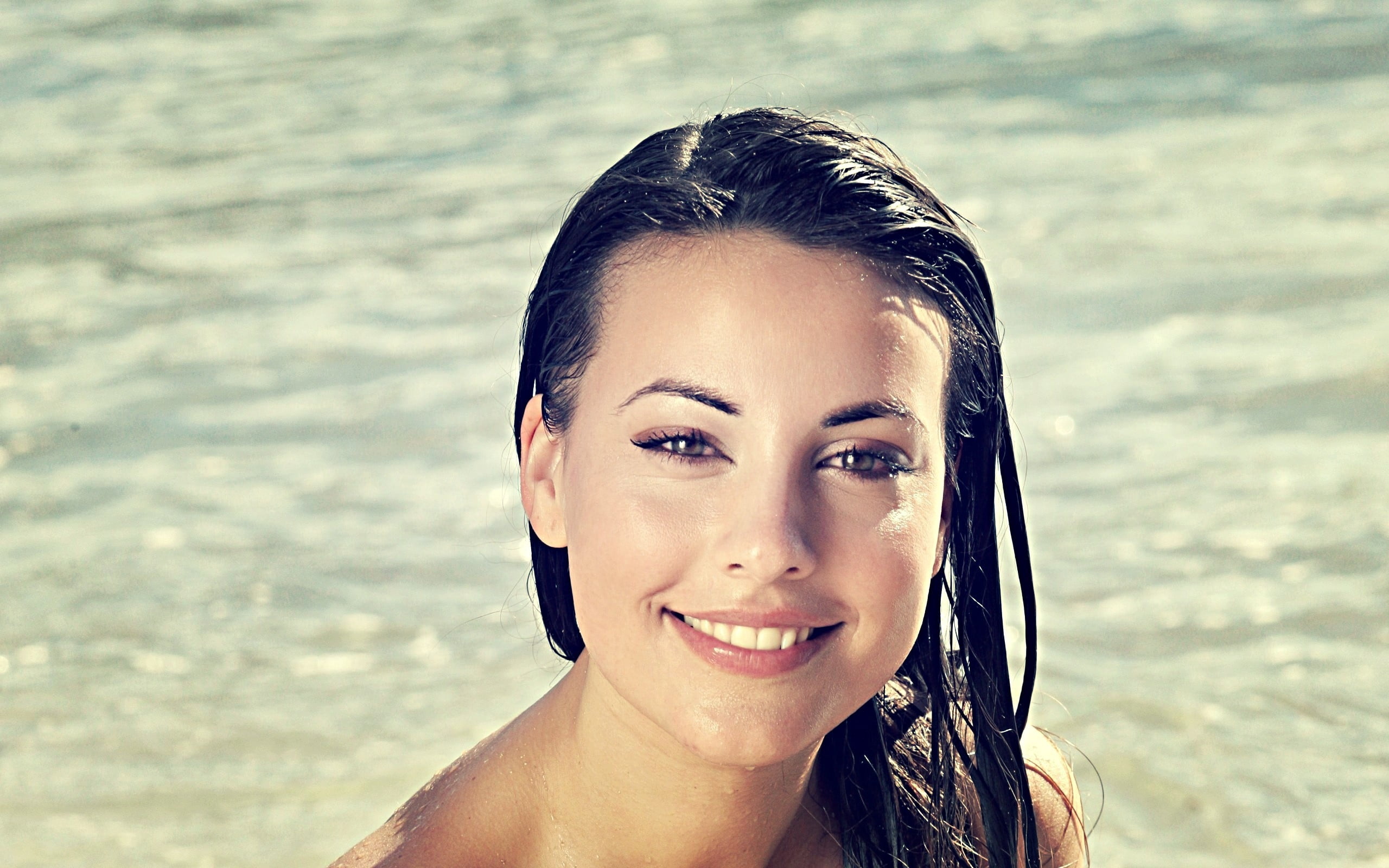 woman on body on water smiling