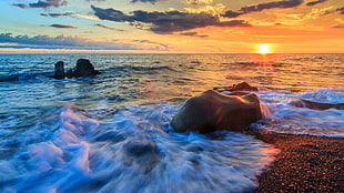time-lapse photography of sea wave splashing on a rack during sunset, fangshan HD wallpaper