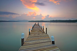 Brown Wooden Footbridge on Body of Water during Sunrise HD wallpaper